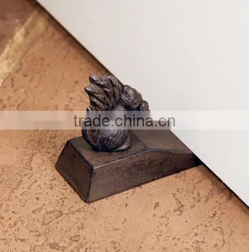 The cast iron mouse door stop