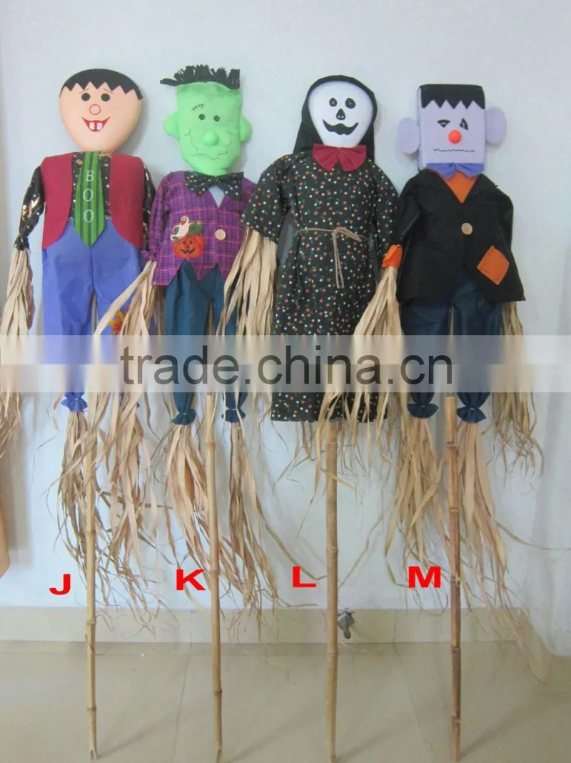 Straw and fabric scarecrow witch for halloween decoration