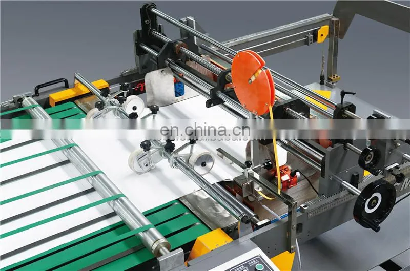 UCM1900A High Speed 4 Roll Automatic Paper cutting slitting Machine with conveyor belt stacker