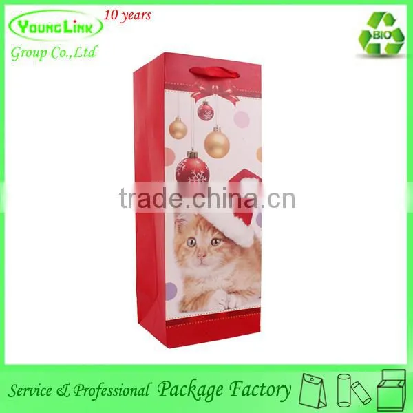 Adorable child toy christmas paper bag with ribbon