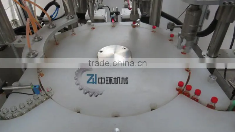 ZHGNX-III mechanical hand style eyedrop filling & capping machine