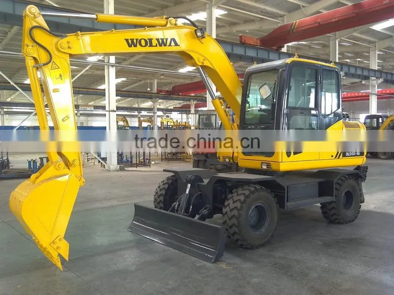wheel excavator with front dump and back fixed leg