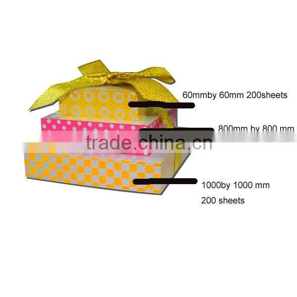 Tower shape paper cube with silk ribbon by shrink film memo pad