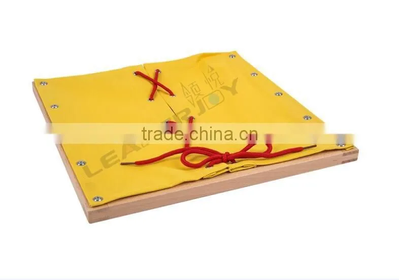 Montessori wooden educational toy of lacing dressing frame