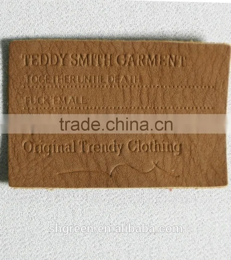 Embossed bear logo leather label for suits
