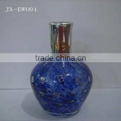 Fragrance lamp with metal cap