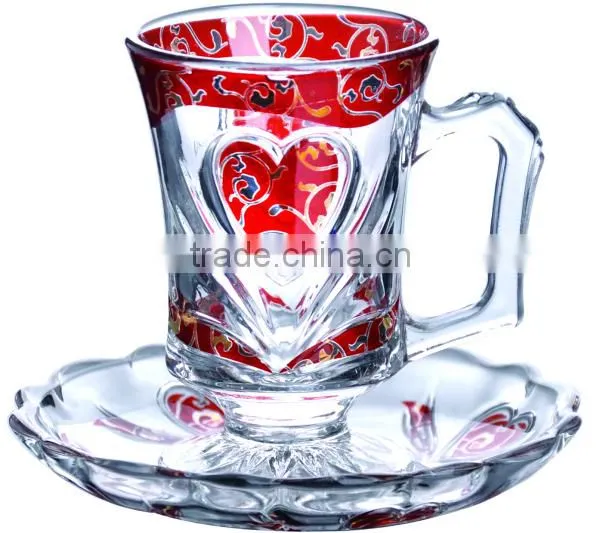 Glass coffee cups and saucers
