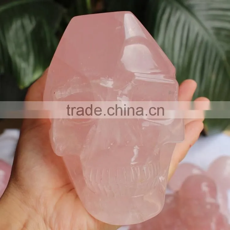 hand made rose quartz natural carved stone skull for healing wands