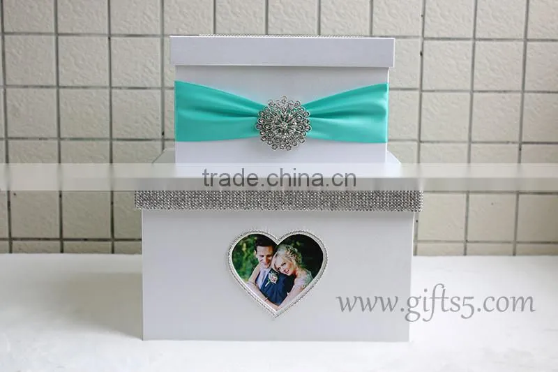 The money box with heart shape photo frame in handmade