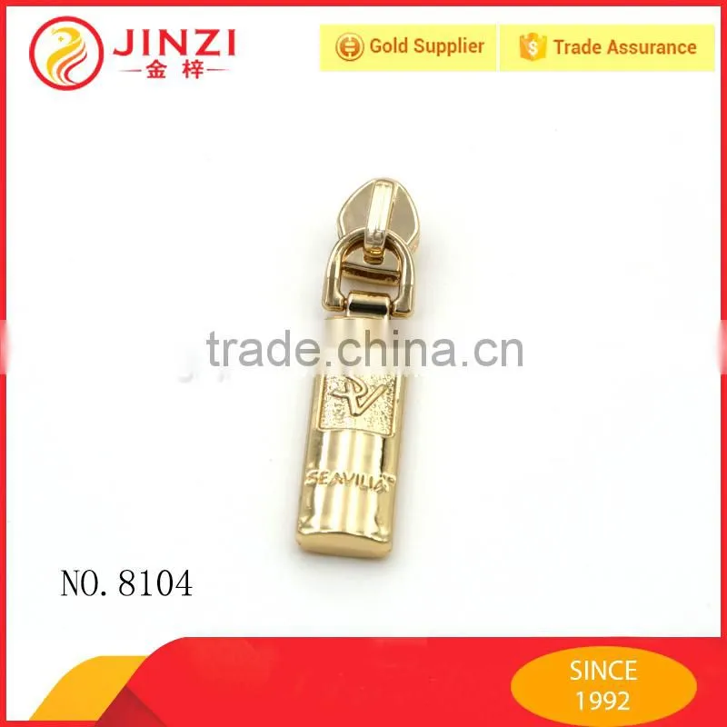 Shiny gold color engraved letters zipper puller