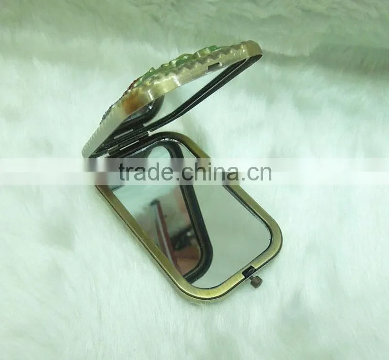 Butterfly and flower bronze pocket mirror with rhinestone