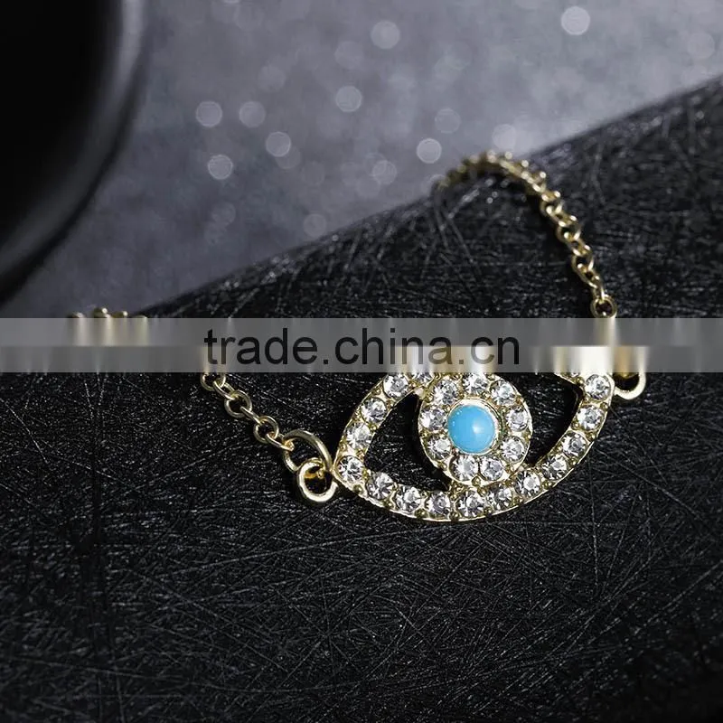 rhinestone evil eye charm gold chain bracelet