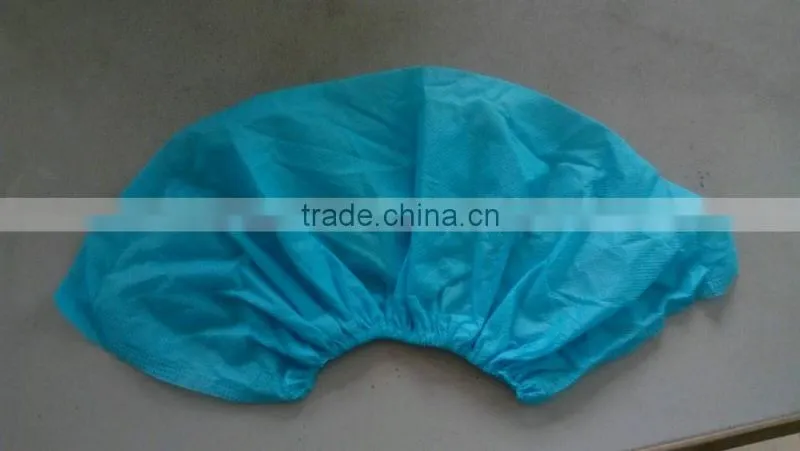 Disposable nonwoven shoe cover