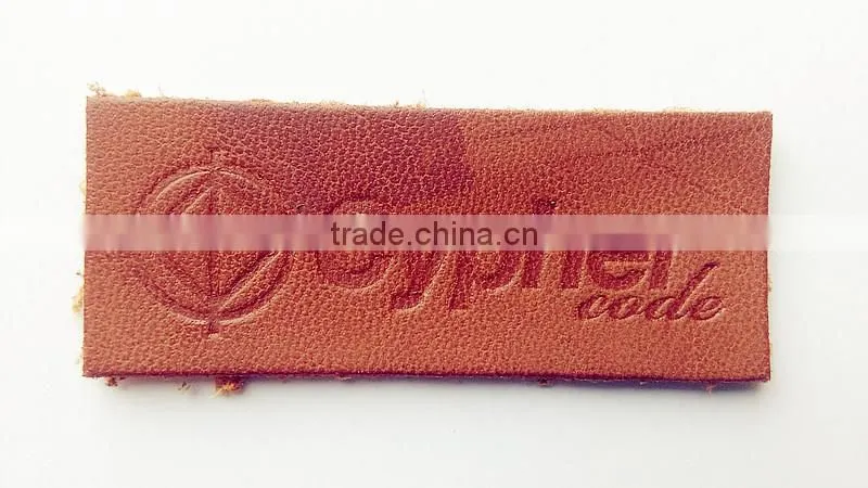 custom good quality fashion jeans pu leather label in china