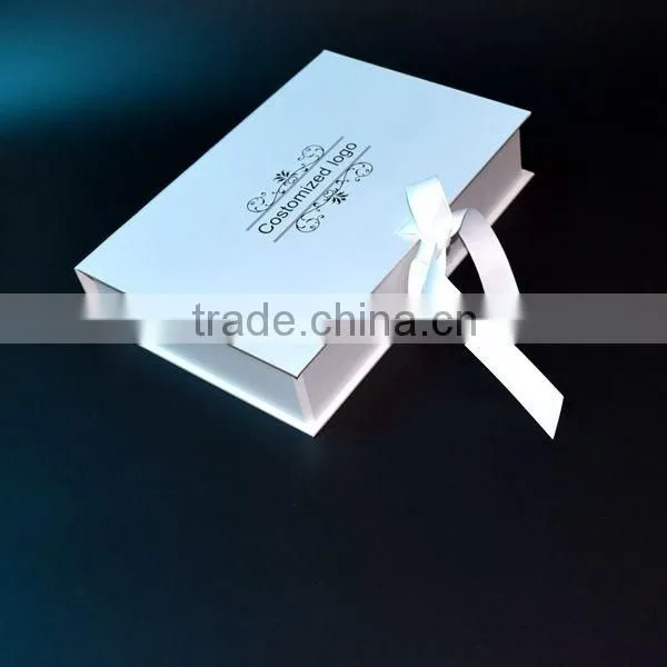 folded rigid cardboard gift boxes with bow tie closure