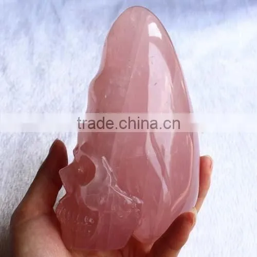 natural rock carved rose quartz crystal skull