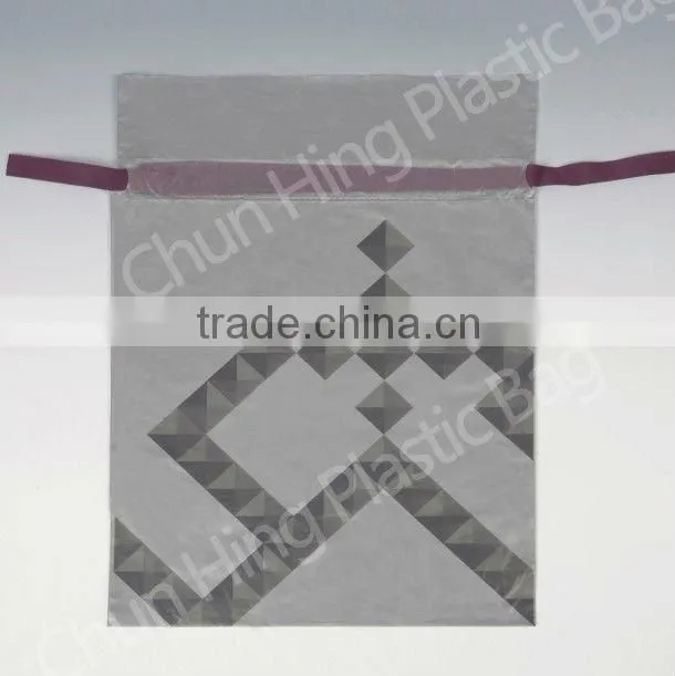 Plastic laundry bag with draw tape
