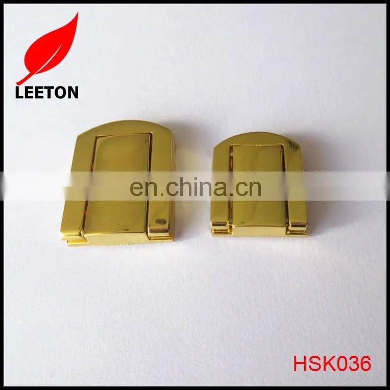 Shiny gold metal lock for wooden box