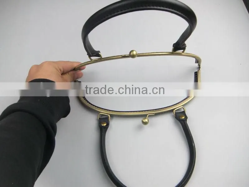 24.3*9.8cm Antique brass handbag frame metal handbags sewing frame with an elegant lock and leather handle for bag
