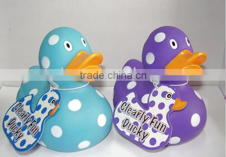 Speckled plastic duck with white dot