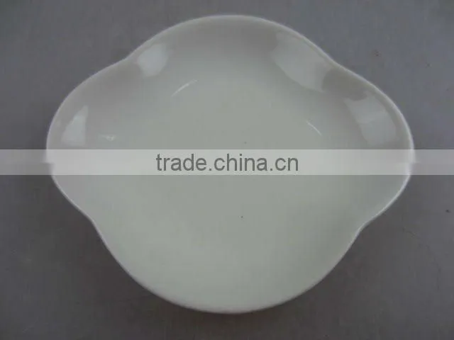 Stock white porcelain flower shaped sauce dish