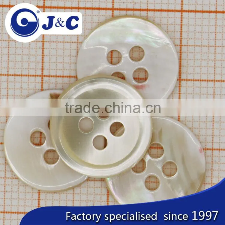 cream coloureed trocas shell button