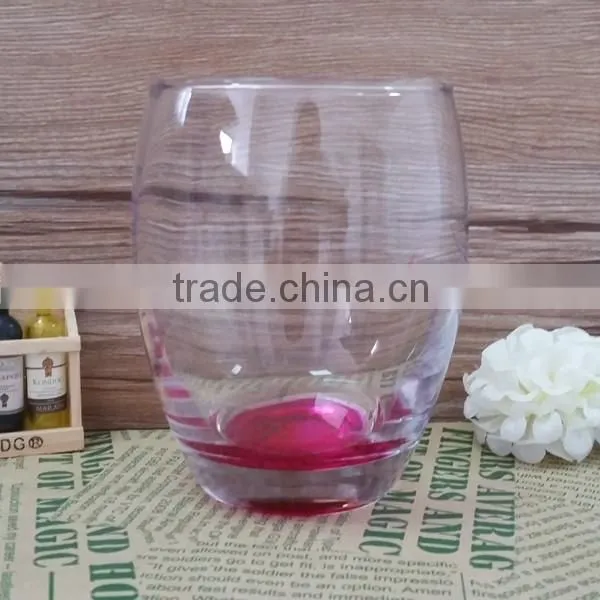 Clear egg shape glass tumbler with 400ML capacity and color bottom