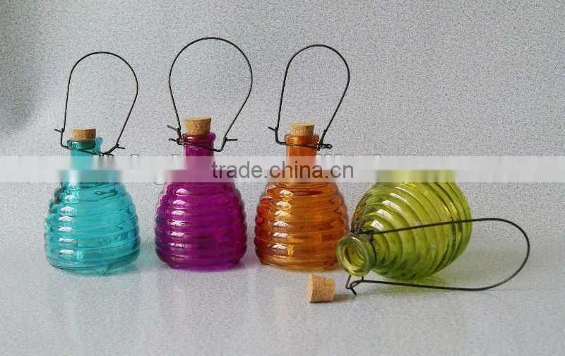 colored glass bee catcher with soft wood lid