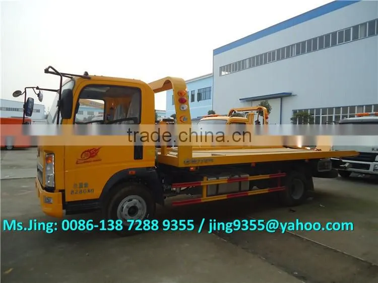 HOWO 3800mm wheelbase cheap wrecker tow truck, L5600*W2300 flatbed wrecker towing truck on sale in Africa