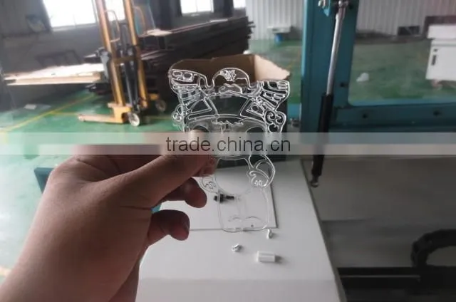 cheap beautiful design jinan Donglian laser cutting and engraving machine price for coconut shell
