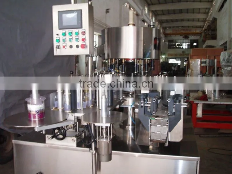 rotary adhesive labeling machine