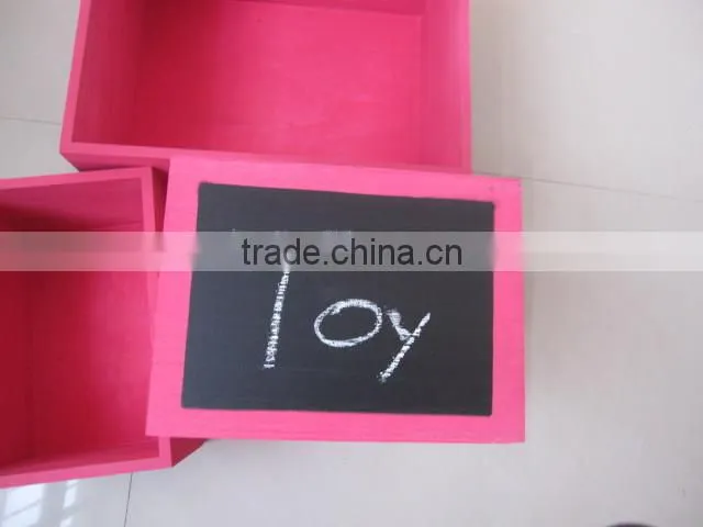colorful wooden boxes with black board