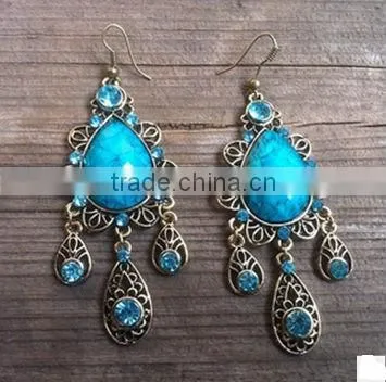 Ruby earrings, noble earrings. Simulation of diamond earrings