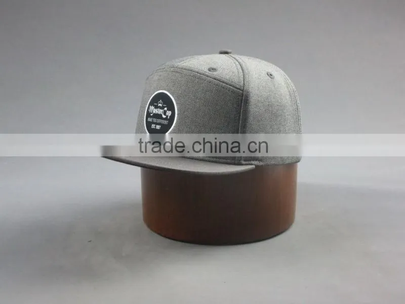 Custom 100% cotton twill 7-panel snapback cap with embroidery logo