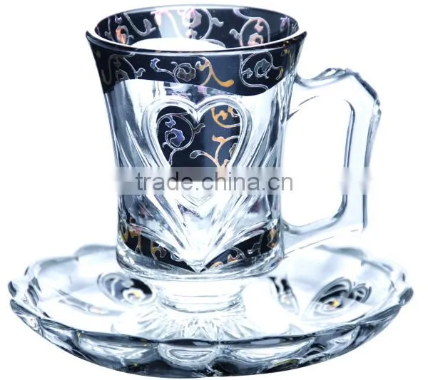 Glass coffee cups and saucers