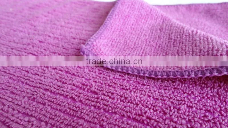 Warp knitted stripe cleaning material