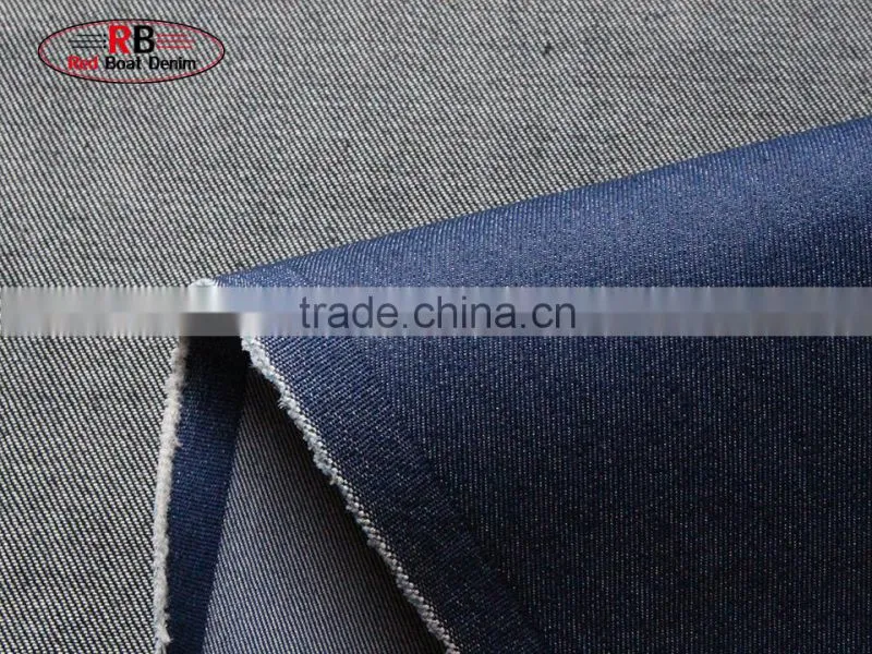 Wholesale indogo color denim fabric jeans material in foshan