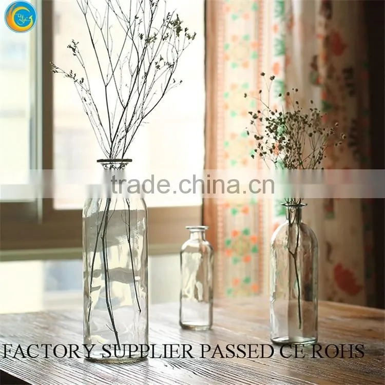 Clear glass cylinder vases and candle holders