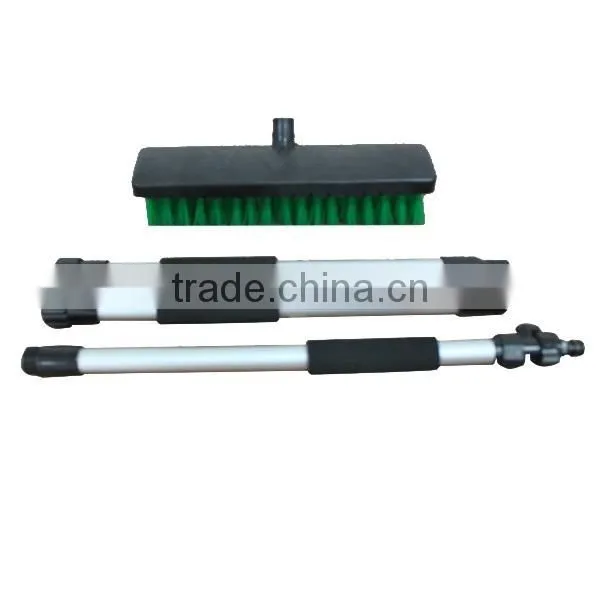 wash garden scrub brush with water flow