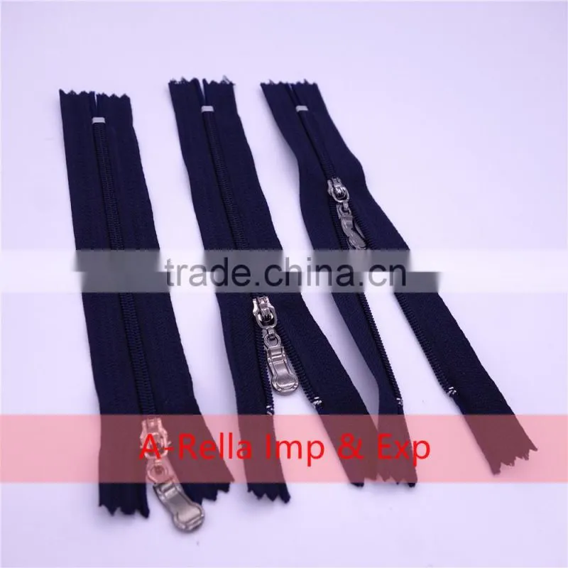Zipper puller with golden elements