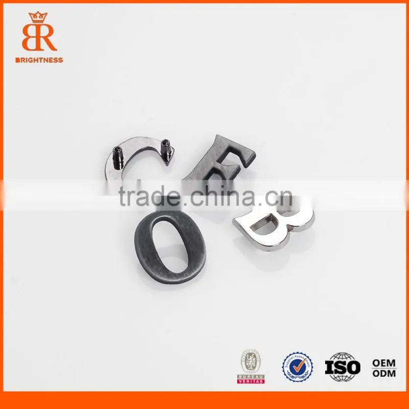 Small metal logo name plate