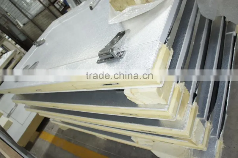 Cold room door with heater for defrost