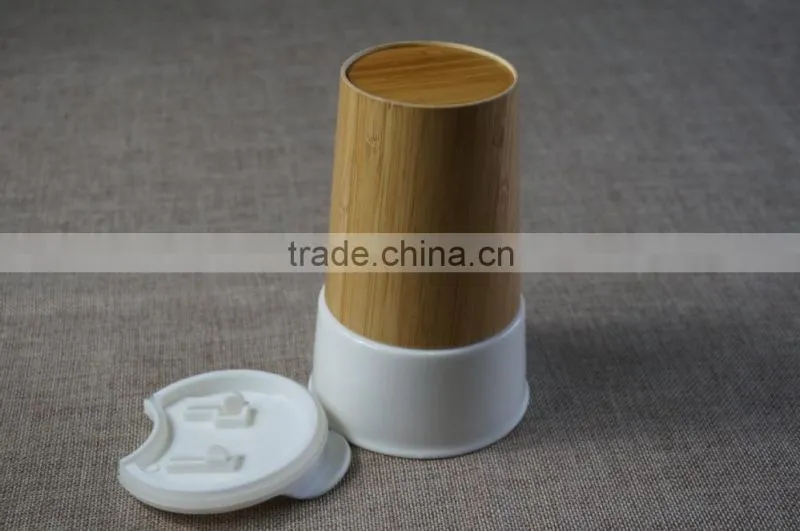 Ceramics coffee cup with bamboo sleeve