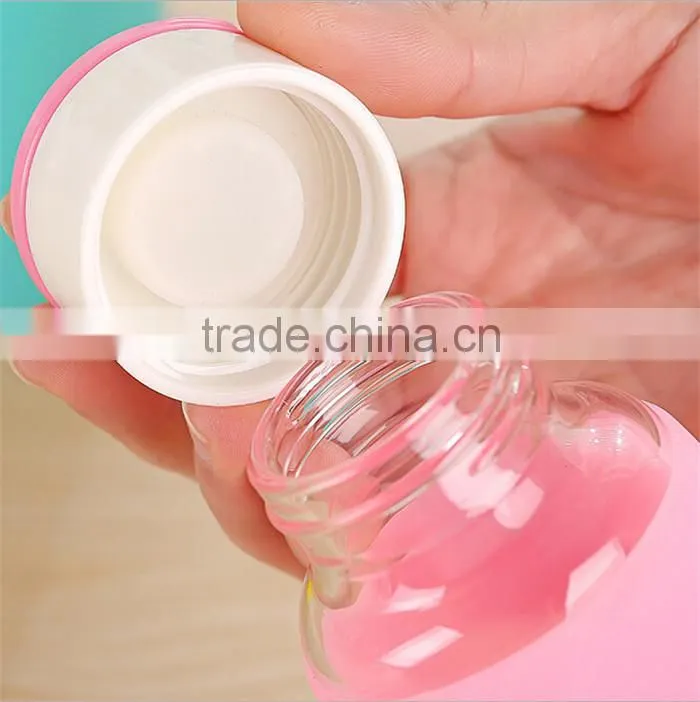 Factory low price of unbreakable silicate glass water bottle,anti heating slicone sleeve glass water bottle