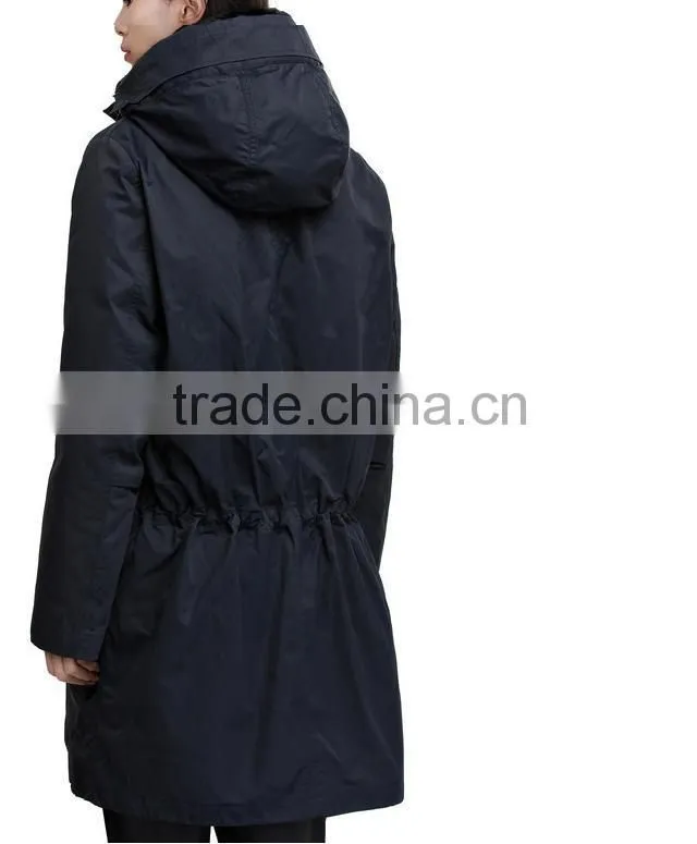 New powder navy is a nylon/waxed cotton blend parka jacket with a faux fur lined hood.