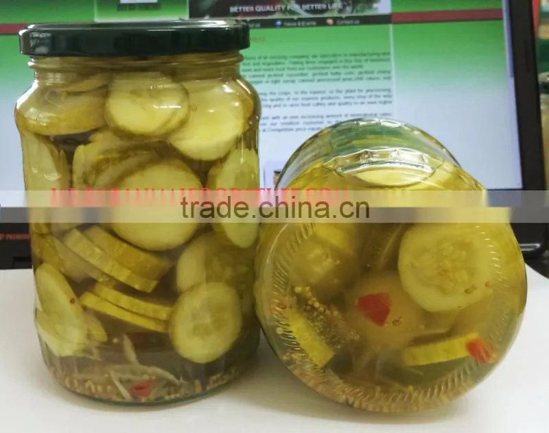 Pickled sliced cucumbers in glass jars