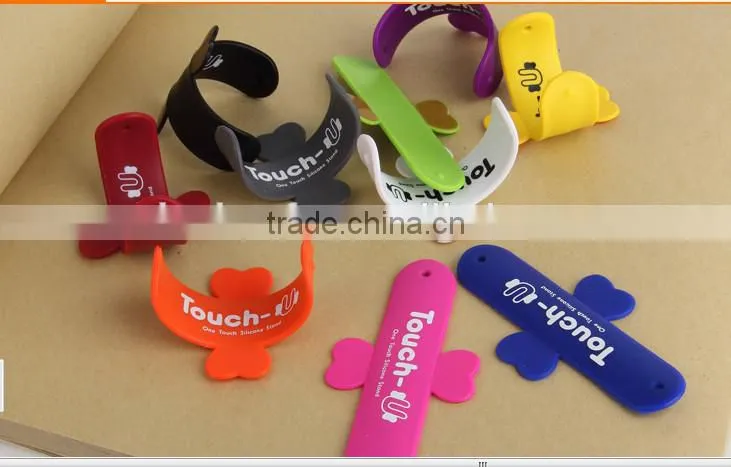 2014 promotional one touch silicone slap smartphone Holder