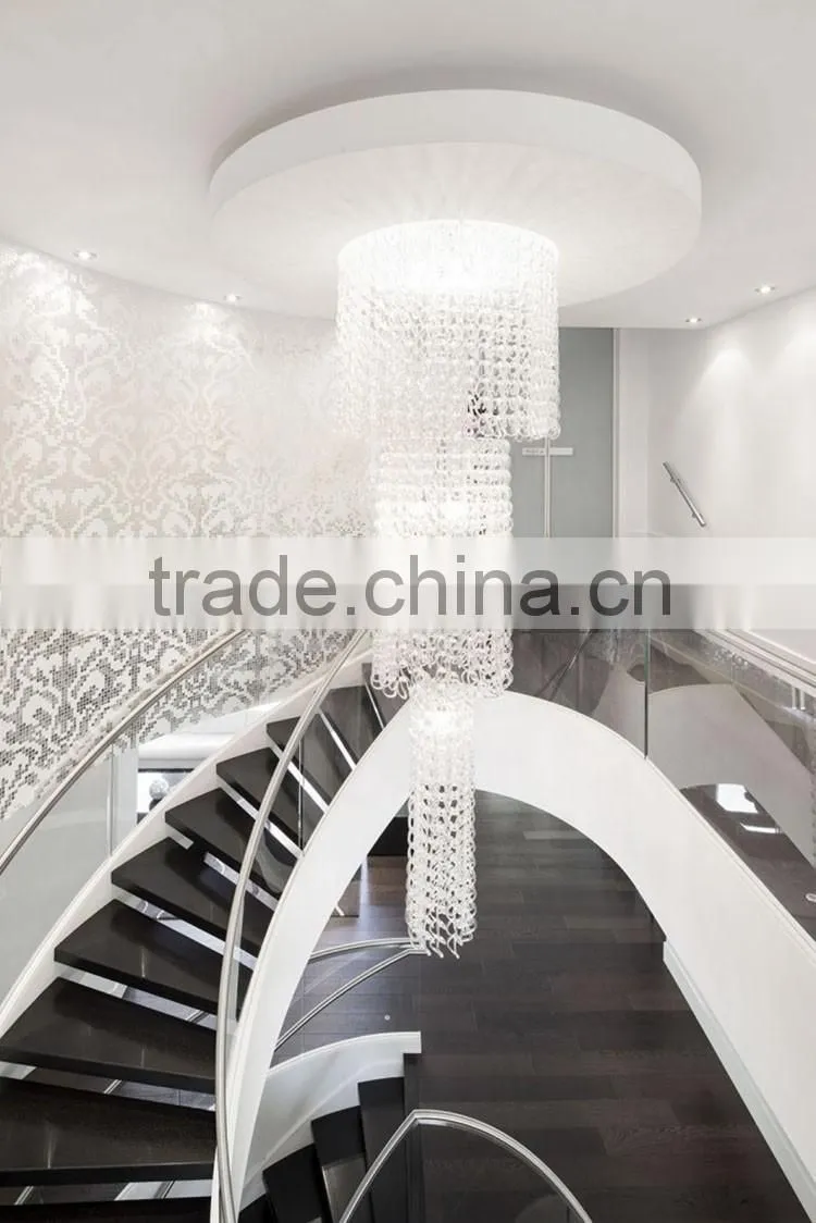 hotel lobby curved stainless steel glass staircase