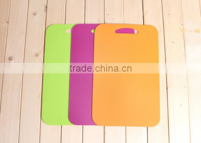 plastic cutting board outside