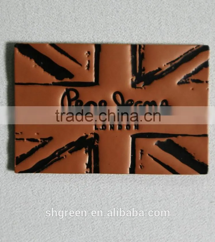 Embossed bear logo leather label for suits